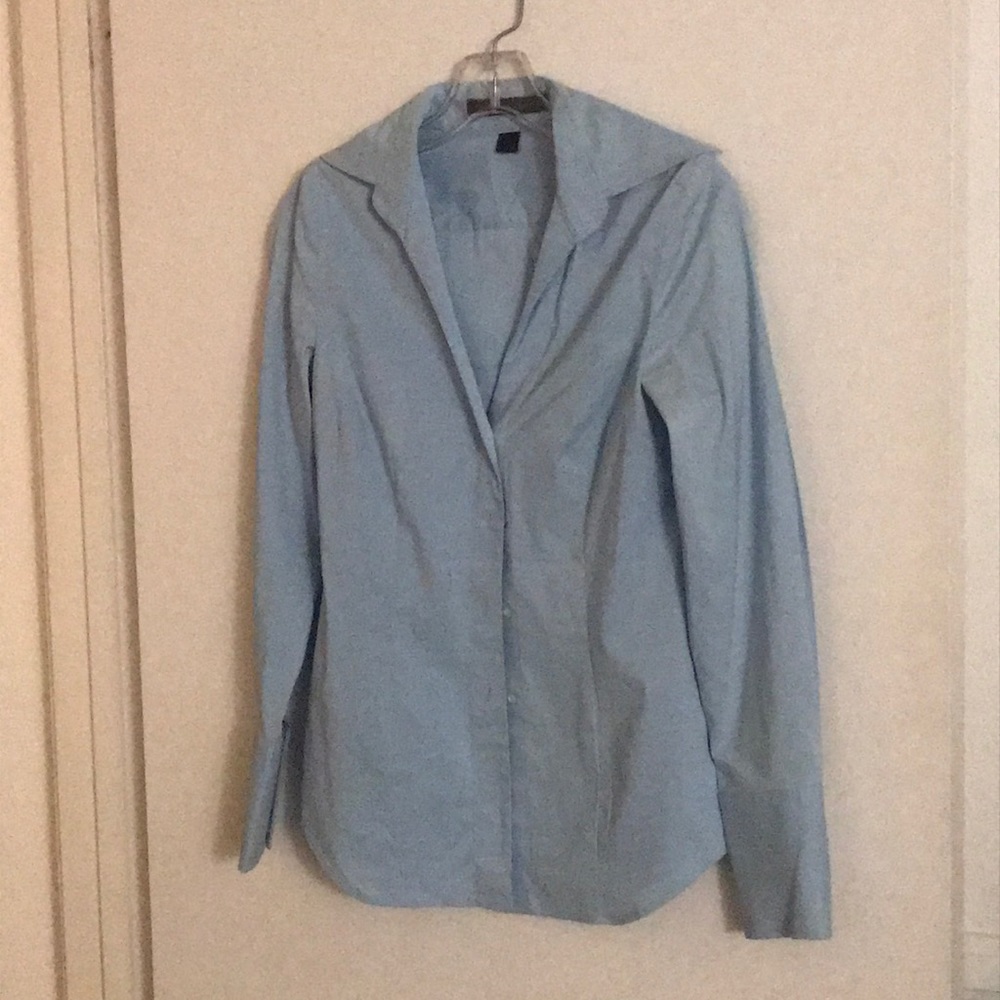 Light blue long sleeve button down shirt.